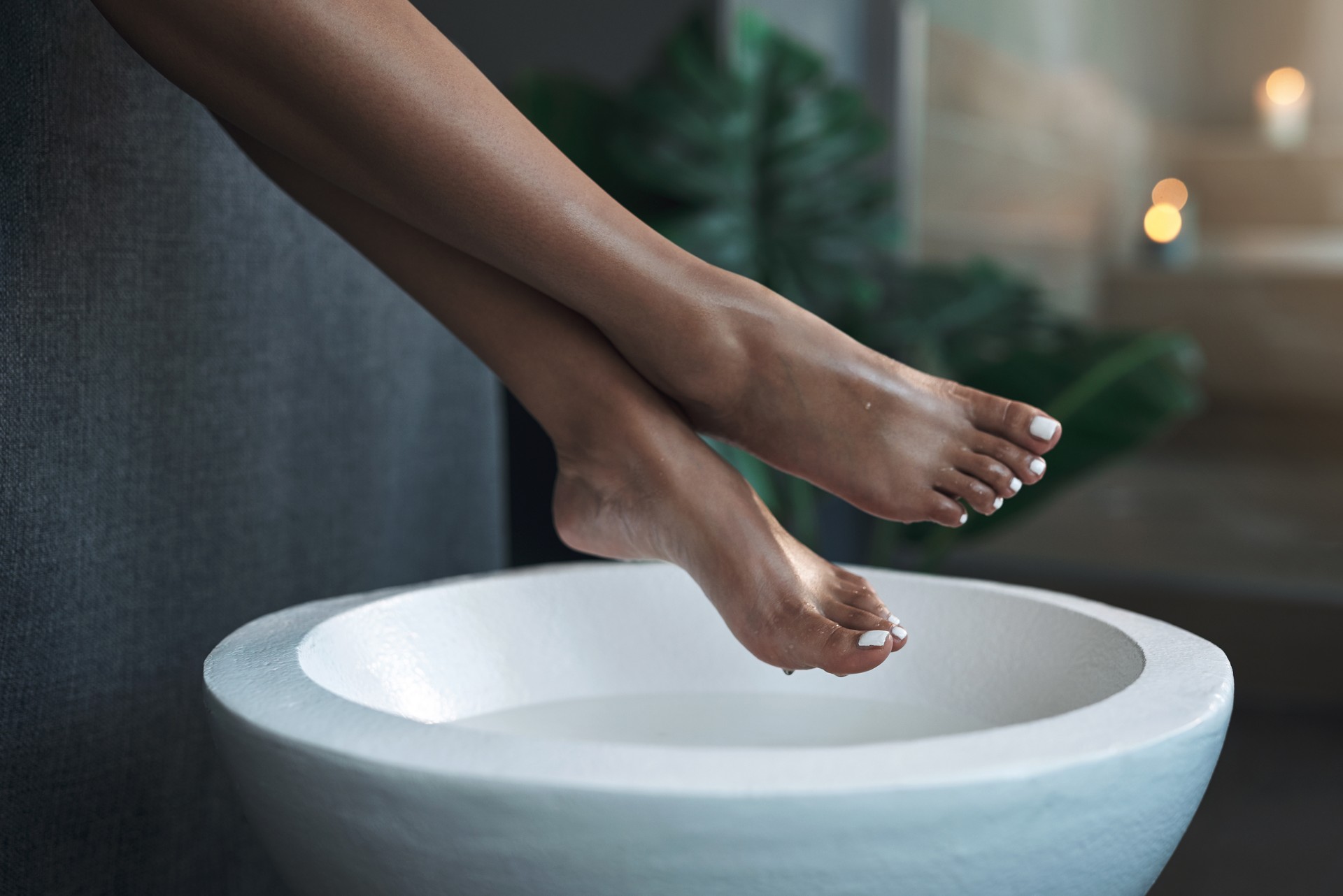 Closeup shot of an unrecognisable woman getting a foot treatment at a spa